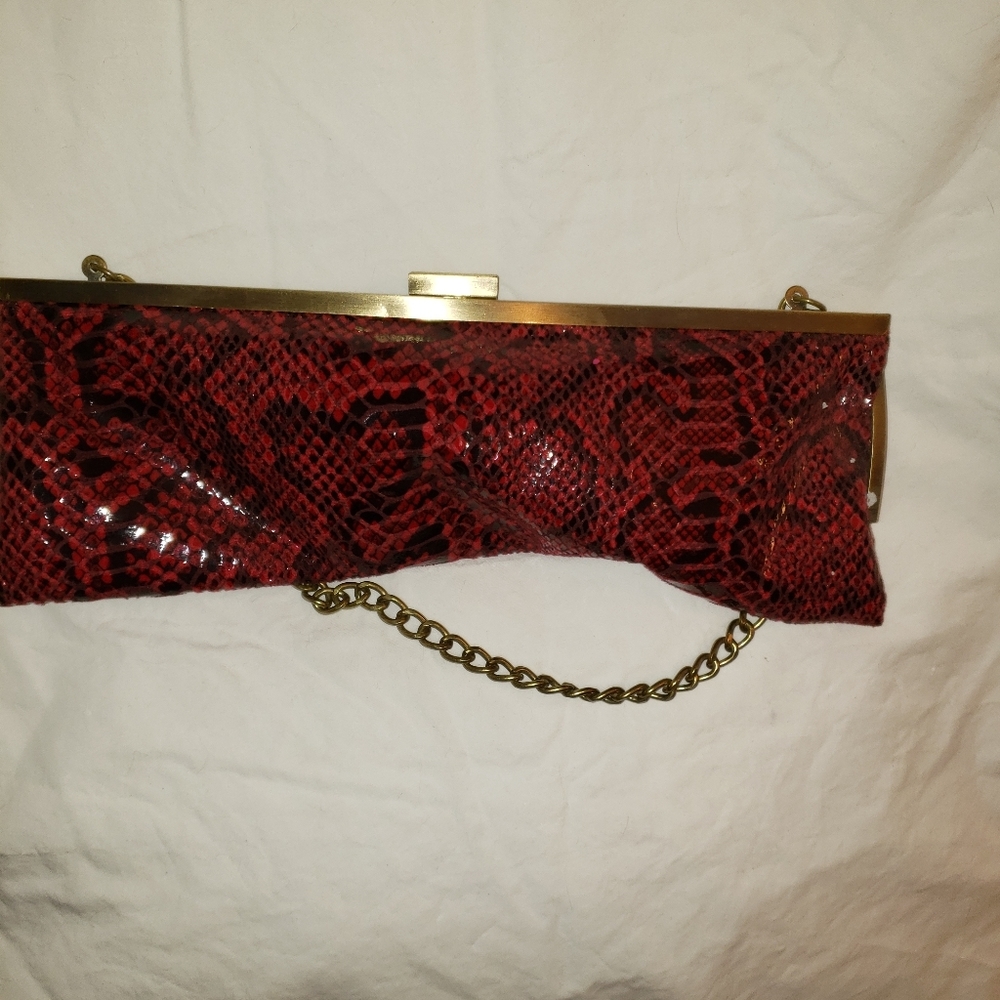 Red and black snakeskin clutch purse with to way c